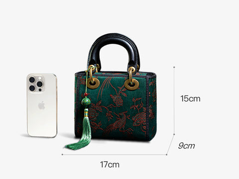 Xiangyunsha Silk Green Retro Cowhide Handbag with Pendant